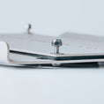 Load image into Gallery viewer, Close-up of silver aluminum mount plate with central bolt and washer detail on white background.