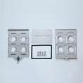Load image into Gallery viewer, Silver aluminum XXL Mount kit with two perforated plates, screws, and a key lock accessory.