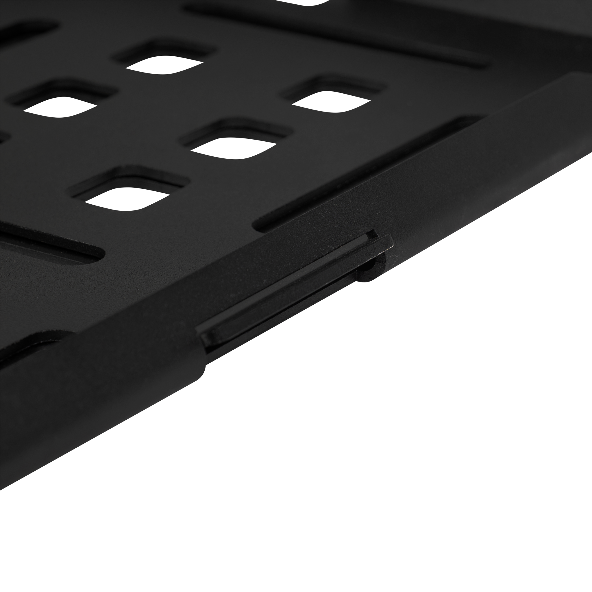Black metal mounting plate with multiple rectangular cutouts and textured edges.