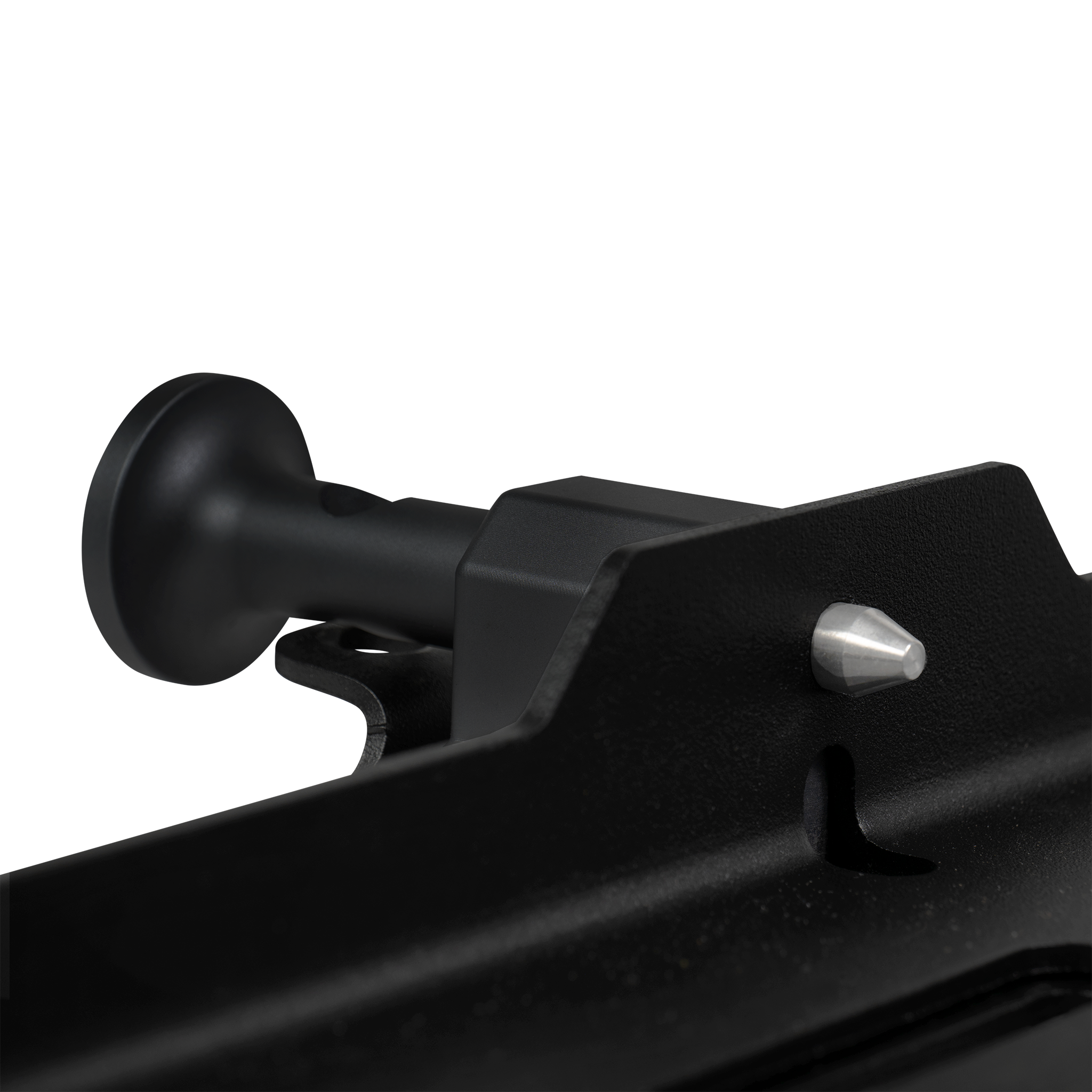 Black metal mount bracket with a round base and a protruding silver pin on angled edge.