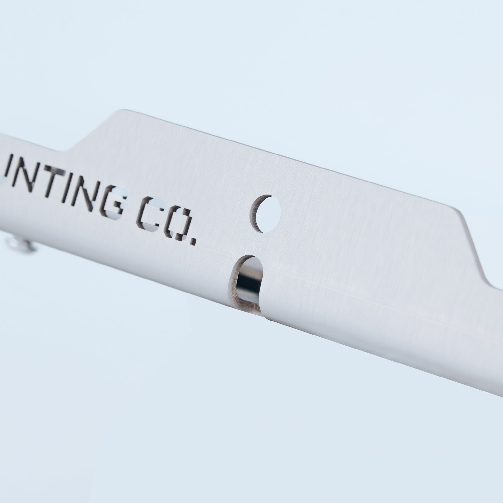 Silver aluminum XXXL Mount with precision cut holes and engraved text detail.