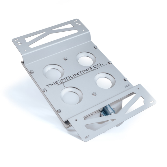 Silver aluminum Starlink mount plate with multiple cutouts and quick-release slots.