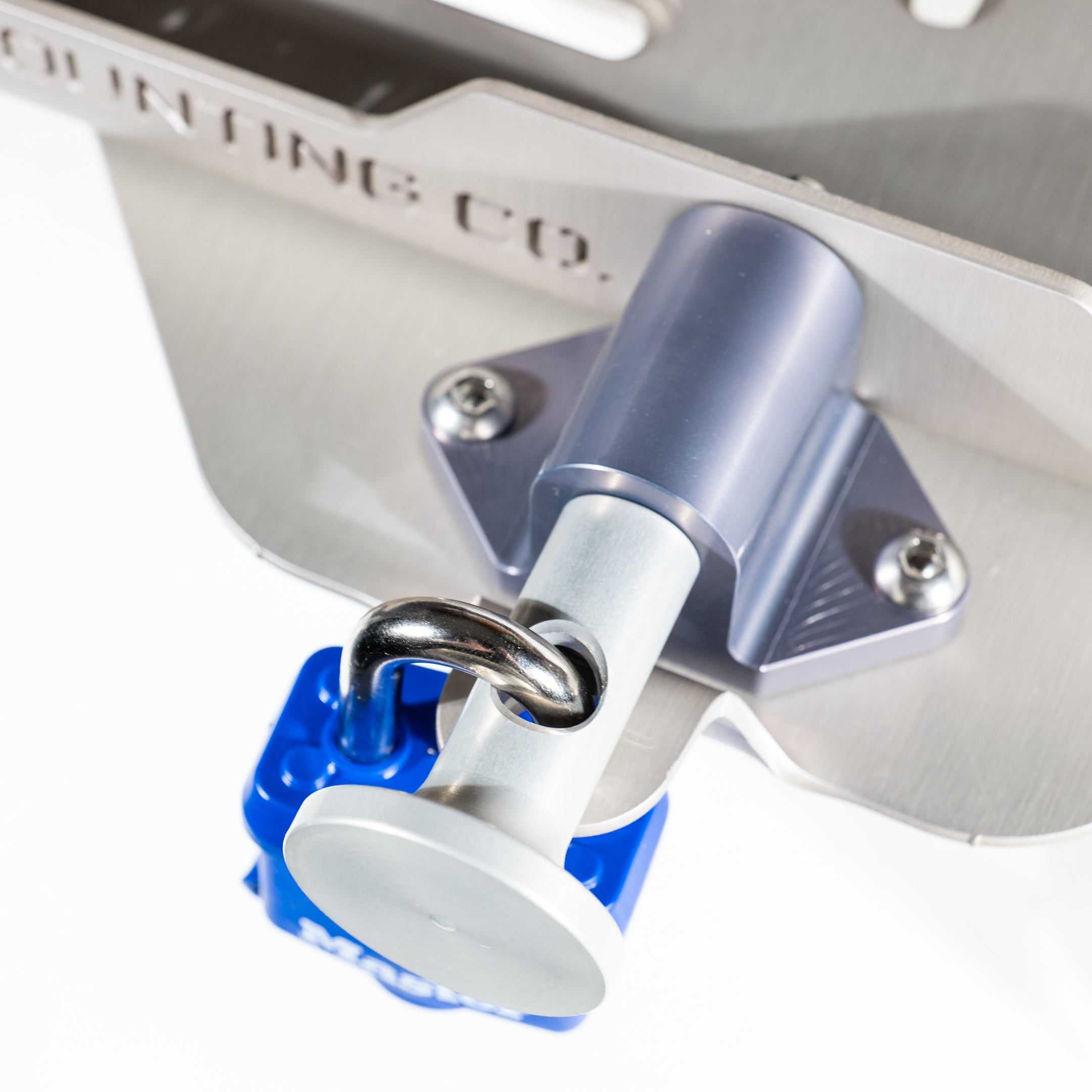 Aluminum pin and block assembly with quick-release blue locking knob and stainless steel mounting plate.