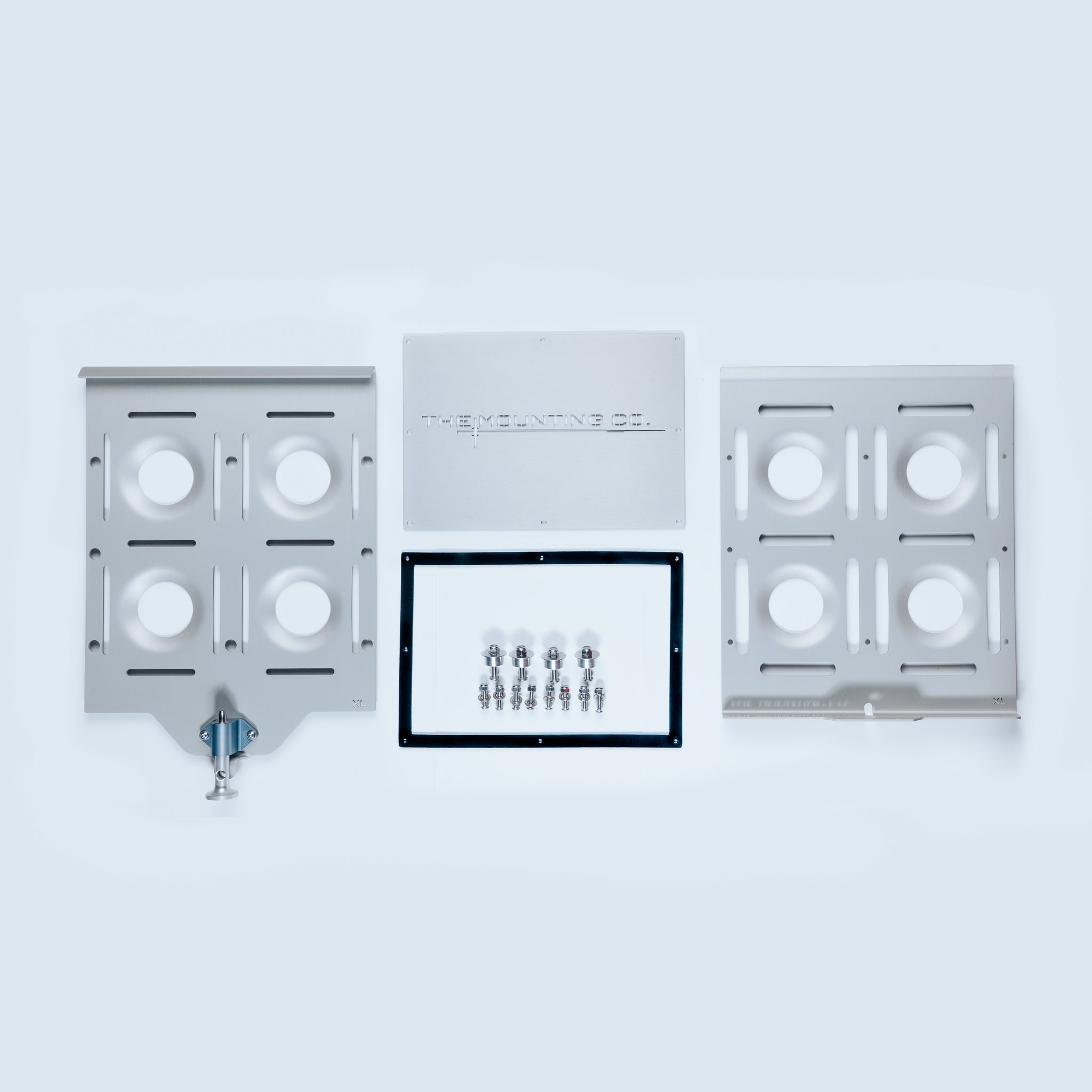 Aluminum XL Mount kit with two perforated mounting plates, metal bracket, and set of screws on white background.