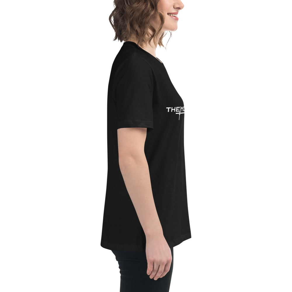 Black relaxed-fit women's t-shirt with short sleeves and white logo text on the chest, side view.