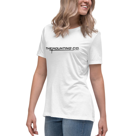 White relaxed fit women's t-shirt with "THE MOUNTING CO." black logo across chest.